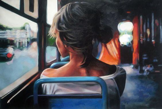 mujer-sentada-de-espaldas-en-un-autobús